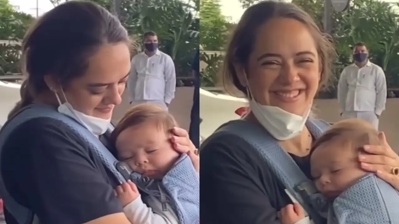 Hazel Keech thanks paparazzi for 'keeping a safe distance and not scaring' her son Orion at airport Hazel Keech thanks paparazzi for 'keeping a safe distance and not scaring' her son Orion at airport